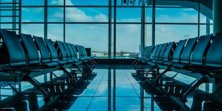 empty chairs in airport terminal