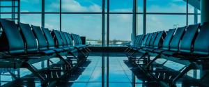 empty chairs in airport terminal